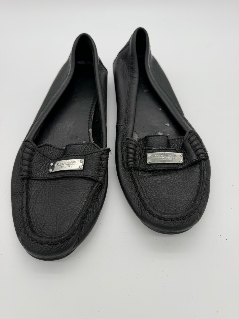 Coach Black Leather Moccasin Flats with Silver Logo Plaque